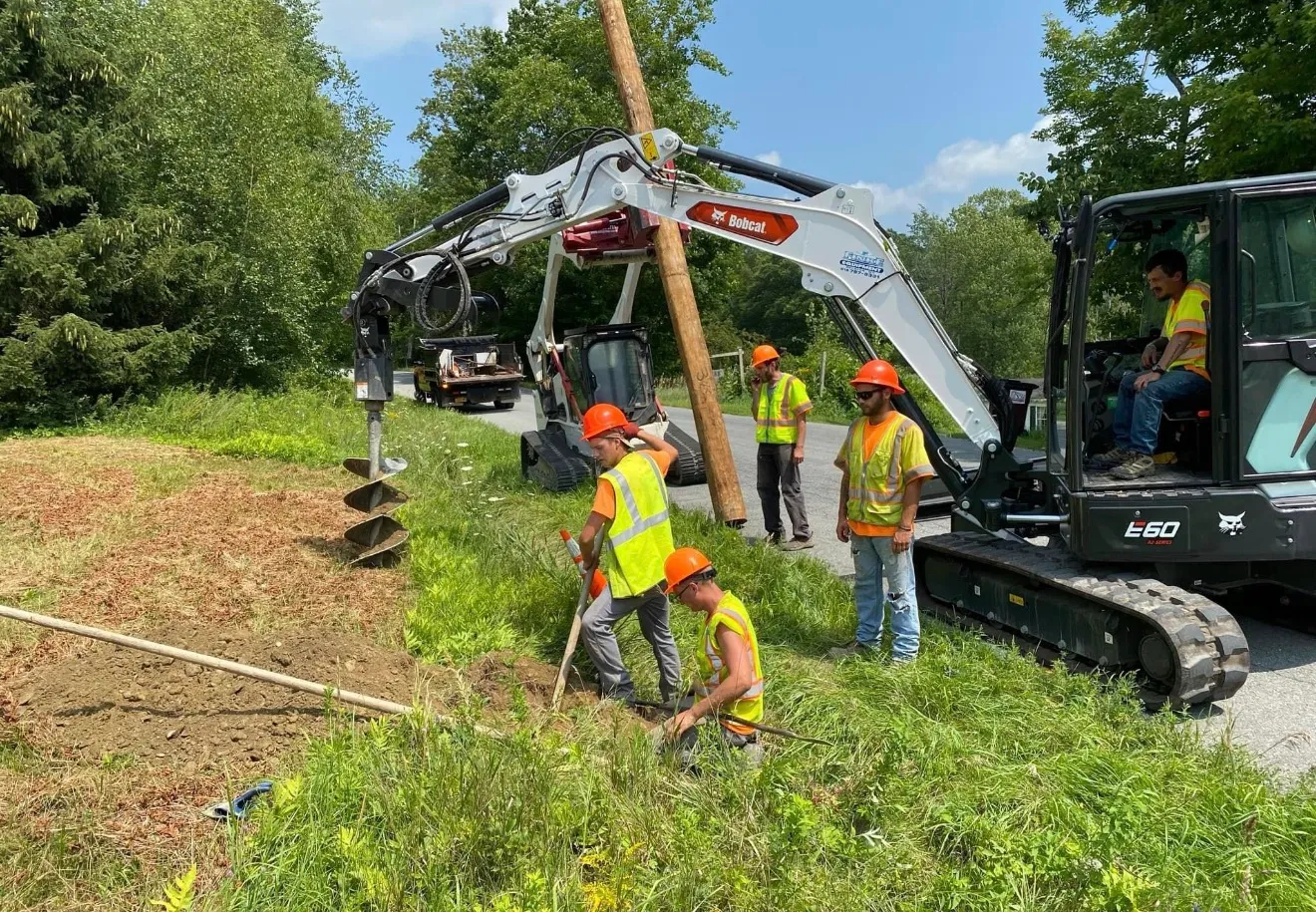 Experienced operator using advanced equipment for foundation excavation at a Mansfield, PA commercial site