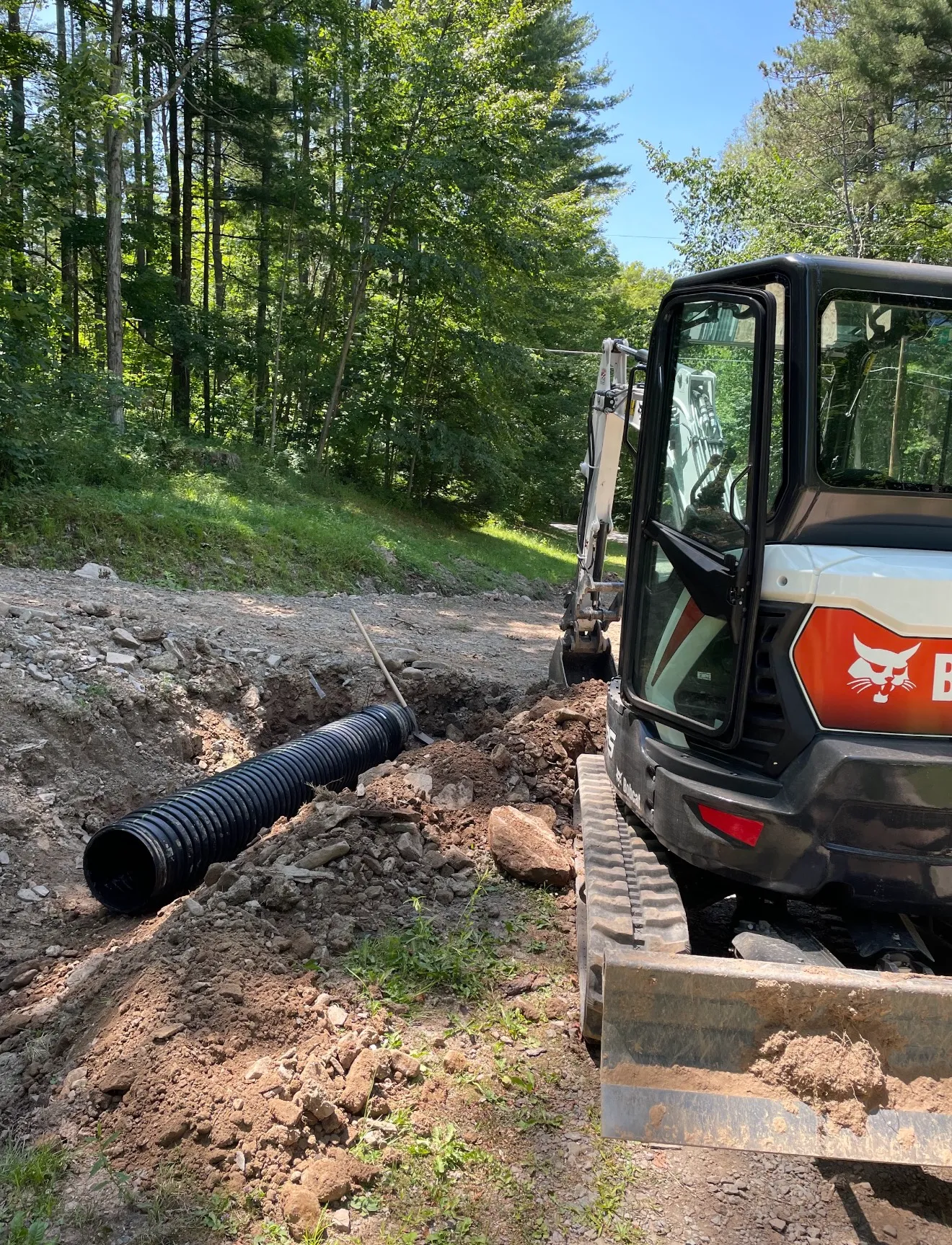 Experienced operator using laser-guided equipment for accurate grading on a Westfield residential property