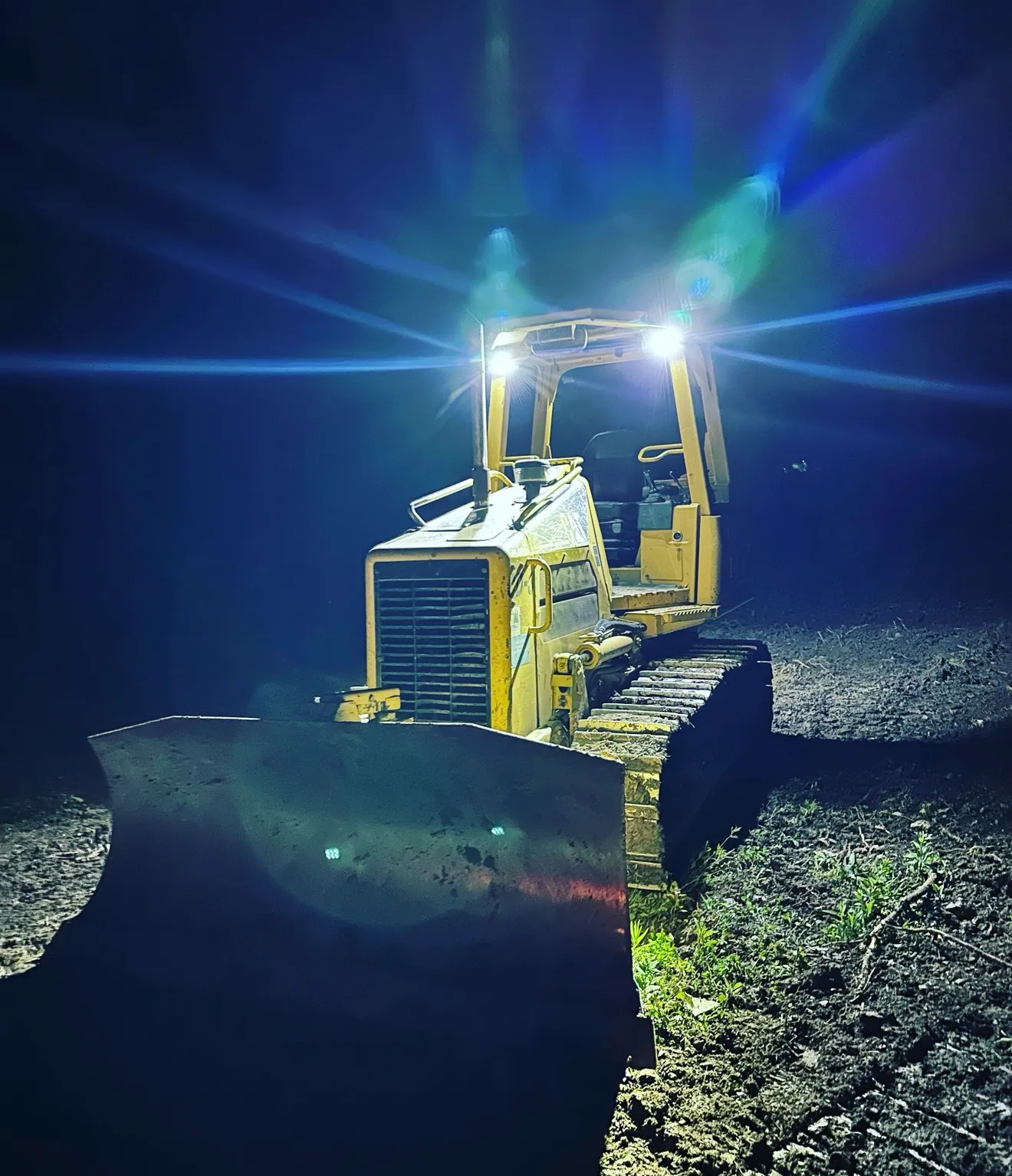 Excavator digging foundation on a residential lot in Sweden Valley, PA during early morning sitework